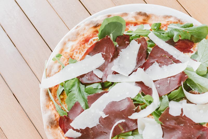 Arugula salad with prosciutto and shaved parmesan